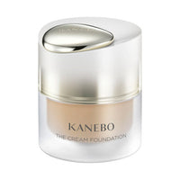 KANEBO Kanebo The Cream Foundation - Kanebo The Cream Foundation / SPF15 / PA+++ / Ochre D / 30ml / Eternity Bouquet scent product bottle on white background