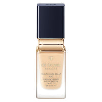 Cle de Peau Beaute Tan Fluid Eclat Matte - Tan Fluid Eclat Matte / SPF20 / PA+++ / Ochre 30 / 35ml product bottle on white background