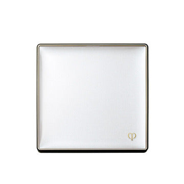 Cle de Peau Beaute Tan Naturel Poudre Blanc Radiant Glow Background