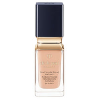 Cle de Peau Beaute Tan Fluid Eclat Natural - Tan Fluid Eclat Natural / SPF25 / PA++ / full product with container / Pink Ochre 10 / 35mL / Scented with natural rose essence - 35ml product bottle on white background