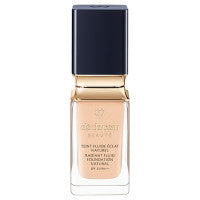 Cle de Peau Beaute Tan Fluid Eclat Natural - Tan Fluid Eclat Natural / SPF25 / PA++ / full product with container / Ochre 10 / 35mL / Scented with natural rose essence - 35ml product bottle on white background