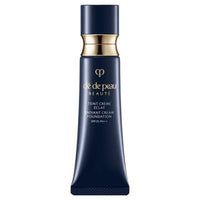 Cle de Peau Beaute Tancream Eclair n - Tinted Cream Eclat n / SPF25 / PA++ / full product with container / PO00 / 25g / Scented with natural rose essence product bottle on white background