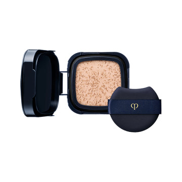 Cle de Peau Beaute Tank Cushion Eclat Lumine - Tan Cushion Eclat Lumine / SPF25 / PA+++ / refill only / Pink Ochre 00 / 15g / Scented with natural rose oil and more product bottle on white background