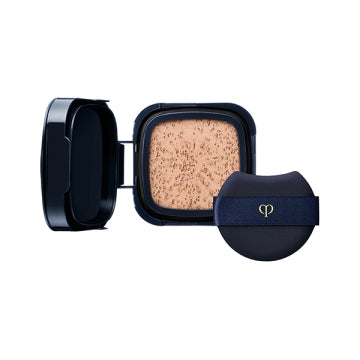 Cle de Peau Beaute Cushion Éclat Lumine (refill only) Ochre 10 Limited Set - Cushion Eclat Lumine / SPF25 / PA+++ / refill only / Pink Ochre 10 / 15g / Scented with natural rose oil and more product bottle on white background