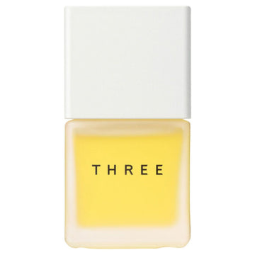 THREE Embracing Facial Oil Essence R Nourishing Radiant Skincare Product White Background