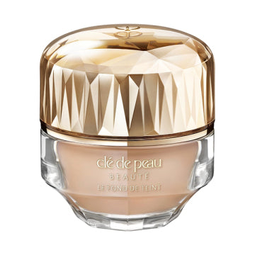 Cle de Peau Beaute The Foundation N - Le Fondutan n / SPF25 / PA++ / full product with container / OC30 / 30g / Scented with natural rose oil, etc. product bottle on white background