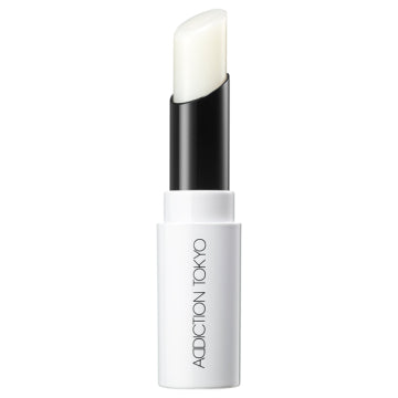 ADDICTION Lip Scrub Balm Exfoliating Formula White Background