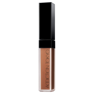 ADDICTION Skin Reflect Fix Concealer - Skin Reflect Fix Concealer / 014 Deep Amber / 6.5mL product bottle on white background