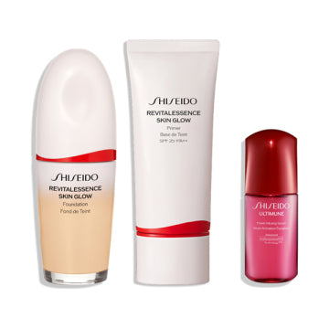 SHISEIDO Essence Skin Glow Foundation - Essence Skin Glow Kit / 140 Porcelain / 30mL, 30g, 10mL - 30ml product bottle on white background