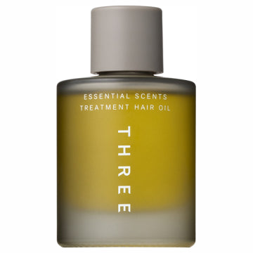 THREE Essential Scents Treatment Hair Oil Luxurious Shine Background