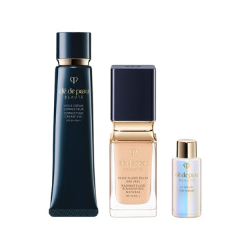 Cle de Peau Beaute Tan Fluid Eclat Natural - Pre-makeup & Foundation Kit (Tan Fluid Eclat Natural Ochre 20) / 40g, 35mL, 7mL product bottle on white background