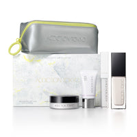 ADDICTION The Foundation Lift Glow - Holiday The Foundation Lift Glow Kit / 000 Porcelain / 2.5g, 15g, 4g, container only, 30mL product bottle on white background