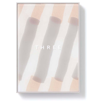 THREE Sacred Space Face Powder Radiant Glow White Background