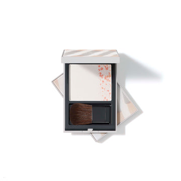 THREE Sacred Space Face Powder Radiant Glow White Background